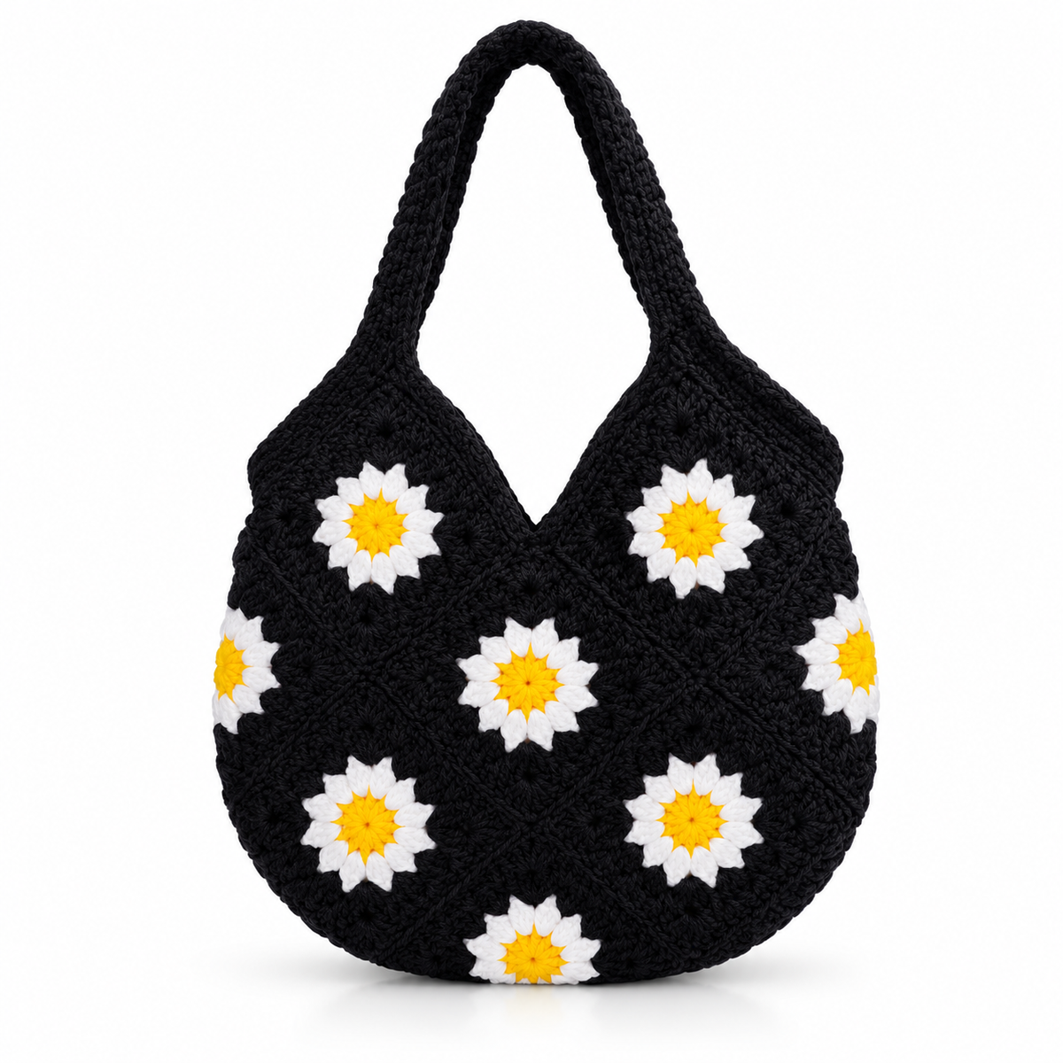 Handmade black crochet shoulder bag featuring white and yellow daisy granny square floral pattern for everyday use.